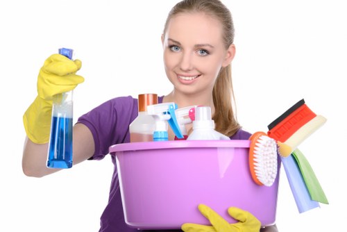 Technician reviewing customer booking details before cleaning